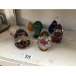 7 glass paperweights including a Wedgwood.