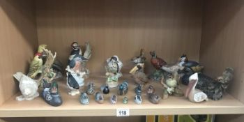 A quantity of bird figures.