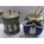 A Wedgwood Jasper ware biscuit barrel and a similar example.