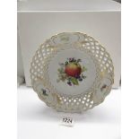 A continental porcelain ribbon fruit bowl with crossed swords makers mark.