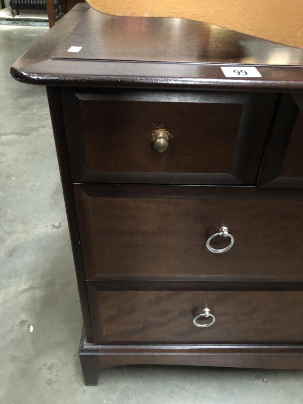 A darkwood stained chest of drawers. - Image 2 of 2