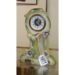 An art nouveau porcelain boudoir clock with figure.