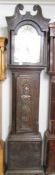 A carved oak long case clock with painted arched dial, 'Wm Bowers, Chesterfield'.