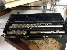 A cased 'Angel' flute.