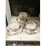 2 large Mason's cups and saucers together with 1 other.