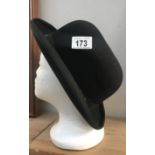 A bowler hat, Christy - London.