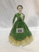 A Coalport ladies of fashion 'Thoughts' figurine.