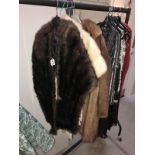 A vintage fur coat, 2 fur stoles and a Frank Usher dress.