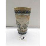 A Doulton Lambeth 1881 tumbler depicting a lion with 2 lionesses.