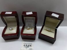 3 good quality dress rings set cubic zirconias.