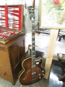 A 1950's Hofner 'Committee' semi acoustic bass guitar.