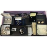 A mixed lot of costume jewellery including necklaces, earrings etc.