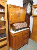 A 1950's stripped pine/ply dresser/kitchen unit with formica top.