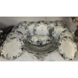 23 pieces of Myott dinnerware including 6 graduated meat platters, 12 dinner plates and tureen.