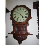 A mahogany wall clock, glass a/f.