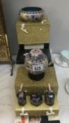 A boxed Cloissonne bowl, a ginger jar and set of 3 trinket boxes.