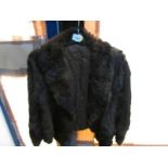 A short fur jacket.