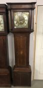 An inlaid oak cased 8 day long case clock, brass moonphase with silvered dial, 'Wm Lister,