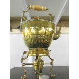 A superb quality Victorian brass spirit kettle complete with burner.