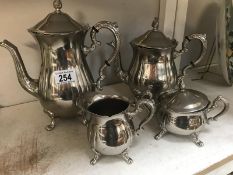 A silver plate coffee pot, teapot, milk jug, lidded sugar bowl etc.