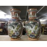 A pair of oriental vases, one a/f.