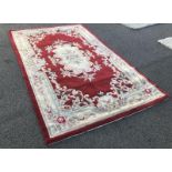 A red patterned rug (length 2.41m x width 1.52m).