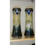 A pair of Royal Doulton art nouveau vases.