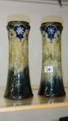 A pair of Royal Doulton art nouveau vases.