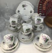 A 32 piece Regency English bone china tea set.