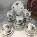 A 32 piece Regency English bone china tea set.