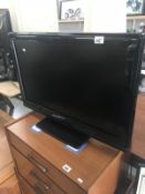 A Toshiba LCD colour TV.