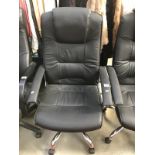 A black leather office chair.