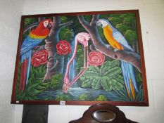 A large picture of parrots on canvas.