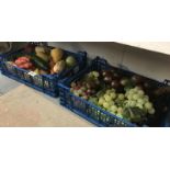 A mixed lot of glass and plastic fruit including grapes, apples, lemons etc.