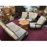 A 4 piece suite including 3 seater sofa, rocking chair etc.