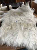 A sheep skin rug.