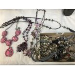 A mixed lot of necklaces.