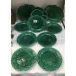 11 Wedgwood plates with green leaf design.