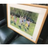 A framed and glazed pastel of children at play, signed T Clepham.