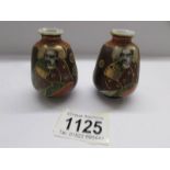 An unusual pair of miniature Satsuma vases.