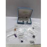 13 loose gemstones including 6.9ct blue topaz, pear amethyst 12.