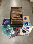 A box of 1960's 45 rpm records, Elvis, Cliff Richard etc.