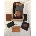 A gentlemans brush set, leather wallets etc.