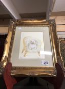 A gilt framed and glazed portrait of a dog on a chair entitled 'Holly' and signed K Fletcher.