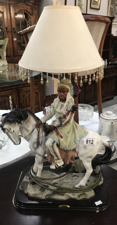 An Indian chief on horse table lamp.