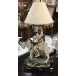 An Indian chief on horse table lamp.