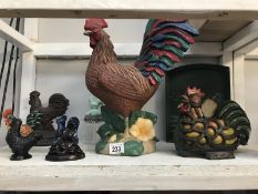 A quantity of chicken and cockerel ornaments including cast iron and glass lantern.
