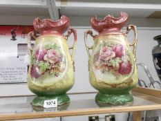 A pair of 19th century Staffordshire vases.