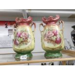 A pair of 19th century Staffordshire vases.