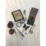 A mixed lot of metal items including button hooks, a spoon, napkin ring etc.